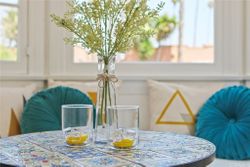 Custom tile breakfast table detail with natural light